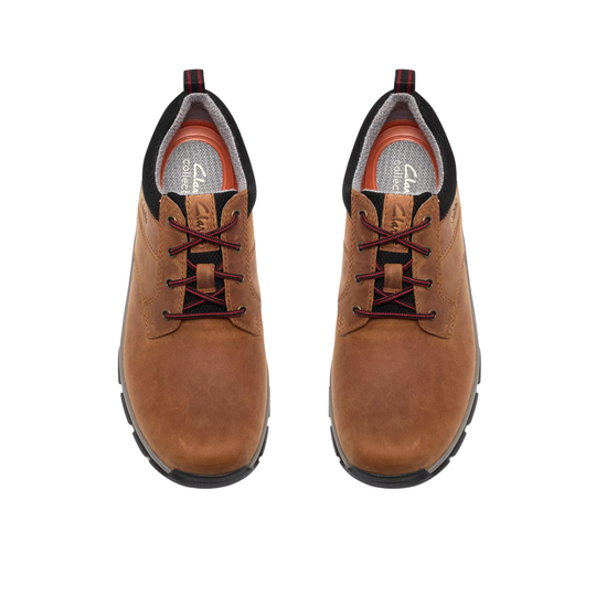 A pair of brown leather lace-up work boots with black soles and black collar trim, shown from a top-down view on a white background.