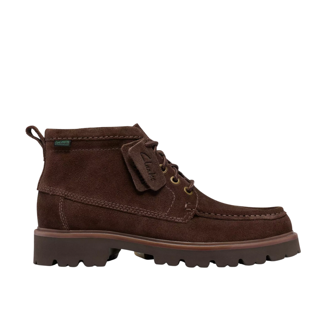 A dark brown suede lace-up ankle boot with a thick lug sole, shown in a side profile on a white background.