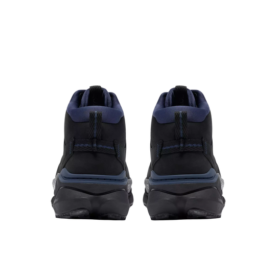 A pair of black and navy blue mid-height athletic sneakers shown from the back, featuring textured soles and a pull tab design, set against a plain white background.