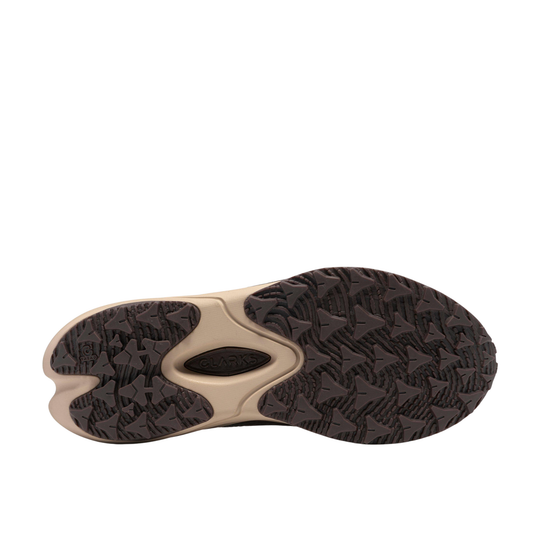 The outsole of a running shoe shown from a top-down view, featuring a dark brown textured tread pattern with a beige central support structure.
