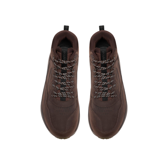 A pair of dark brown suede mid-top sneakers with black and white braided laces, shown from a top-down view on a white background.