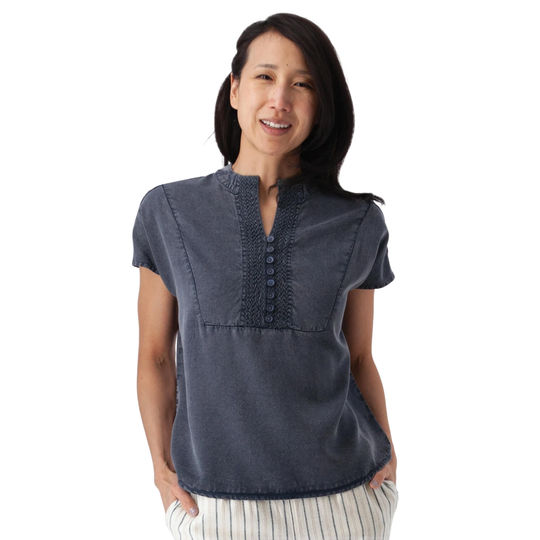 Woman wearing a blue shirt on a white background
