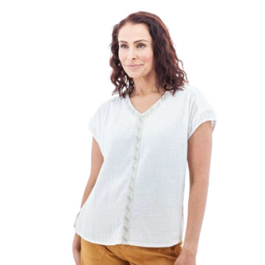 Woman wearing a white blouse on a white background