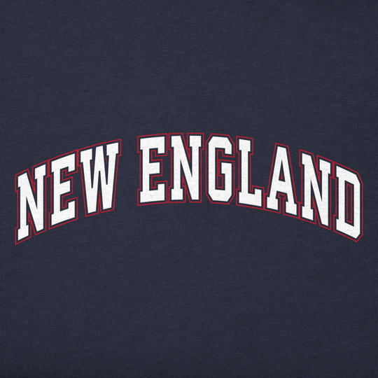 Close-up of a navy blue fabric surface with large arched white block letters outlined in red reading “NEW ENGLAND.”