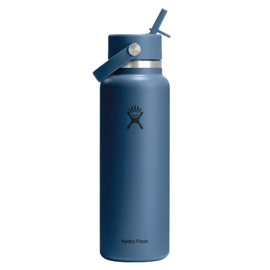 A blue Hydro Flask insulated water bottle with a matching blue flip-straw lid and carry loop, shown on a plain white background.