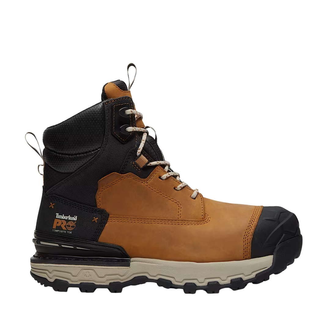 A Timberland Pro work boot in brown and black leather with a beige sole, shown from a side profile view on a white background.
