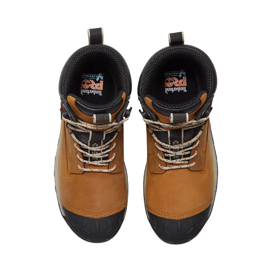 A pair of Timberland mid-height work boots in brown leather with black rubber toe caps and black collar lining, shown from a top-down view on a white background.