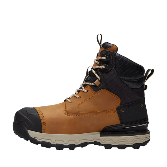 A Timberland Pro work boot in brown and black leather with a beige sole, shown from a side profile view on a white background.