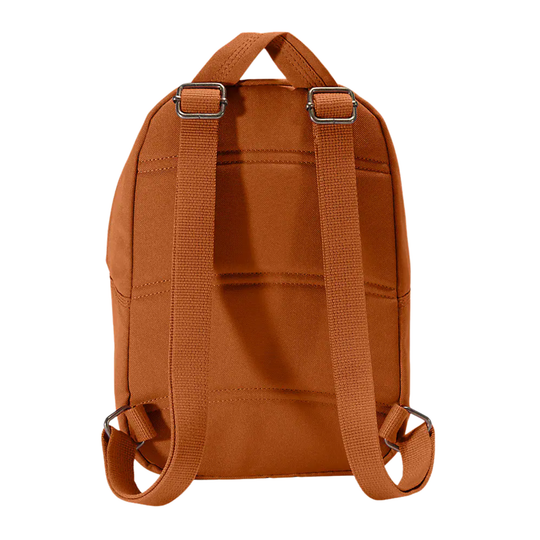The back view of a small brown canvas backpack with adjustable webbed shoulder straps and silver metal buckles, shown on a plain white background.