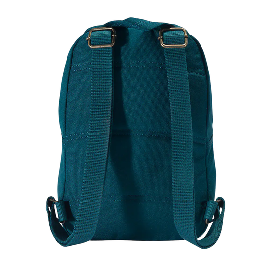 The back view of a teal canvas backpack with adjustable webbed shoulder straps and gold-tone metal buckles, isolated on a white background.