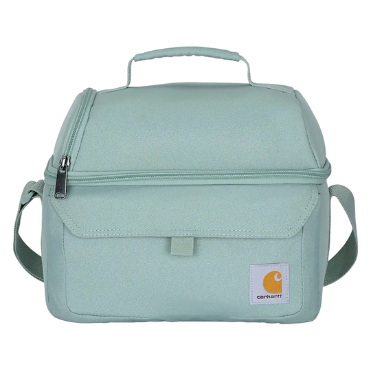 A light mint green fabric camera bag with a top handle, front zippered pocket, and an adjustable shoulder strap, shown against a plain white background.
