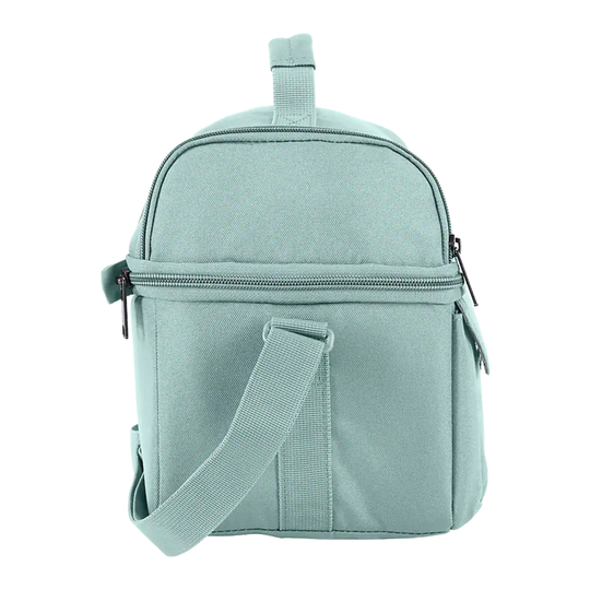 A light mint green canvas crossbody backpack with a top handle, front zipper pocket, and adjustable shoulder strap, shown against a plain white background.