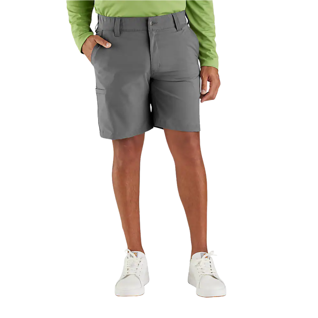 A model wearing gray cargo shorts, a green long-sleeve shirt, and white sneakers, shown from the waist down against a plain white background.