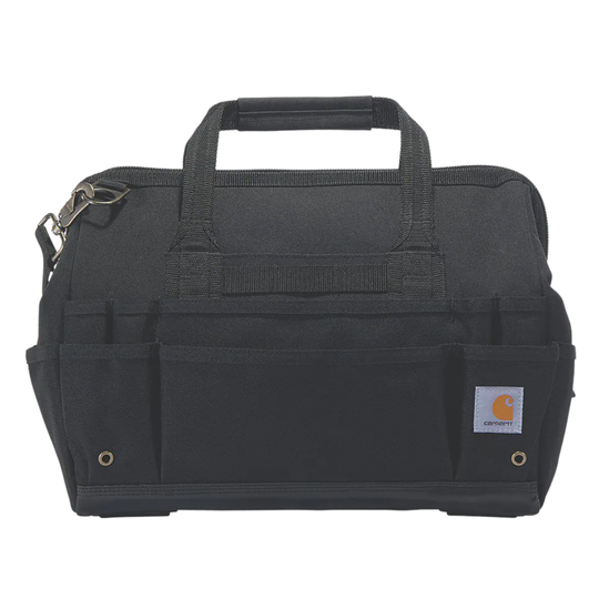 A black Carhartt tool bag with multiple front utility pockets, top carry handles, and a small Carhartt brand patch on the lower right front, shown against a plain white background.