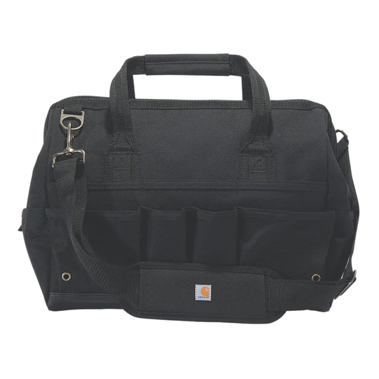 A black Carhartt tool bag with multiple front utility pockets, top carry handles, and a small Carhartt brand patch on the lower right front, shown against a plain white background.