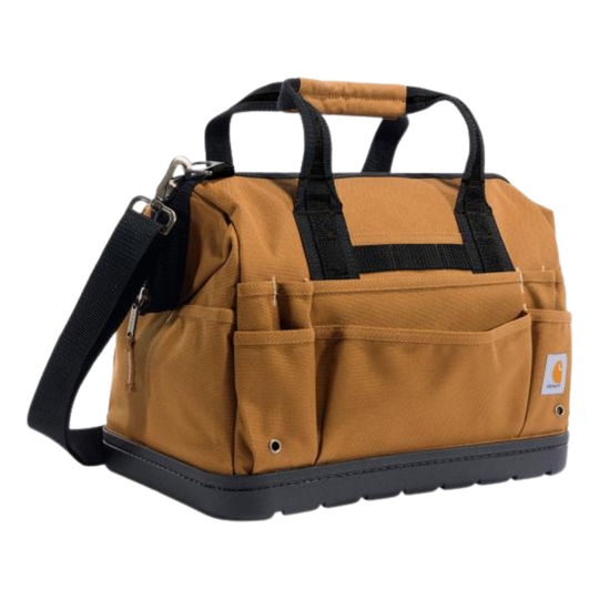 A Carhartt brown canvas tool bag with black handles, a black shoulder strap, and a black base, shown on a white background.