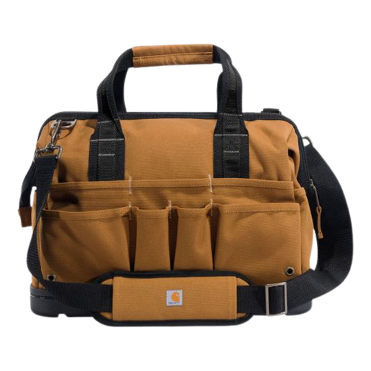 A Carhartt tool bag in a classic brown canvas with black webbing handles, straps, and trim, featuring multiple front utility pockets and a top handle, shown against a plain white background.