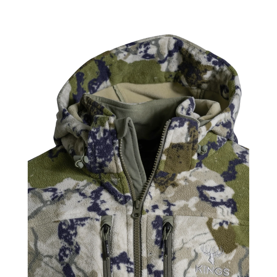 A hooded zip-up jacket in a digital camouflage pattern featuring olive green, beige, and dark navy/black shapes, shown on a plain white background.