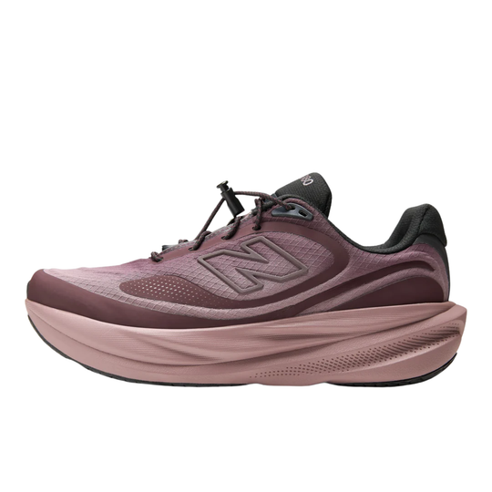 A New Balance running shoe in a dusty mauve and burgundy colorway, featuring a thick, cushioned pinkish-brown sole and a dark gray 'N' logo on the side, shown against a plain white background.