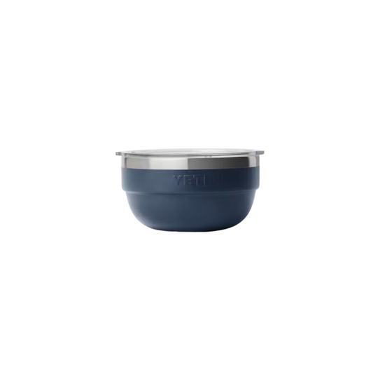 A YETI insulated tumbler bowl in navy blue with a brushed silver stainless steel interior and rim, shown on a clean white background.