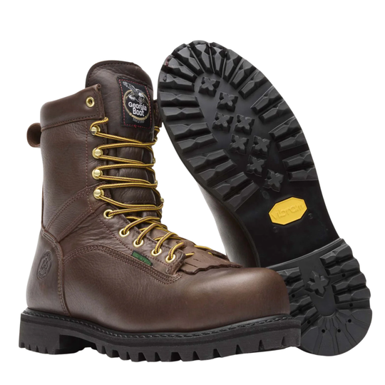 A dark brown leather lace-up work boots with gold-colored metal eyelets and a black rubber sole, shown from a back heel profile on a white background. Black bottom sole shown with Vibram logo.
