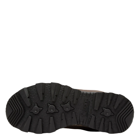 A close-up, top-down view of a black rugged shoe sole, showing deep tread patterns and embossed branding on a plain white background.