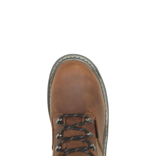 Brown leather boot with black laces on a white background