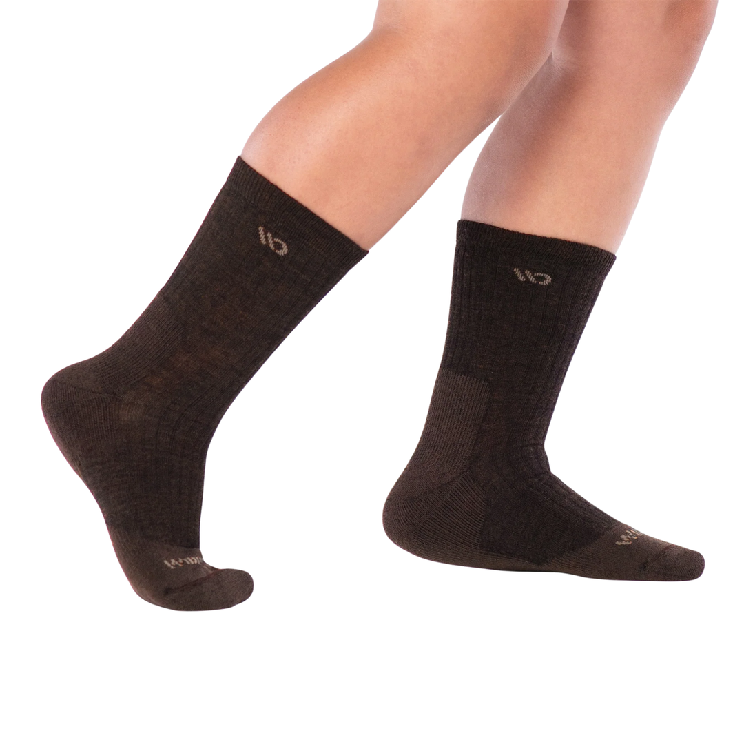 A pair of dark brown ribbed crew sock with a small beige logo near the cuff and a matching beige logo on the toe, shown against a plain white background.