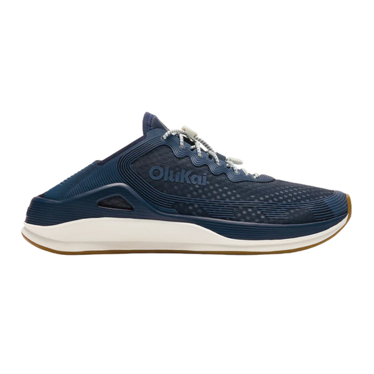 Blue running shoe with white sole on a white background