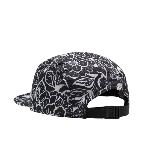 A black and white floral patterned 5-panel cap shown from the back, featuring a black adjustable strap with a plastic buckle.