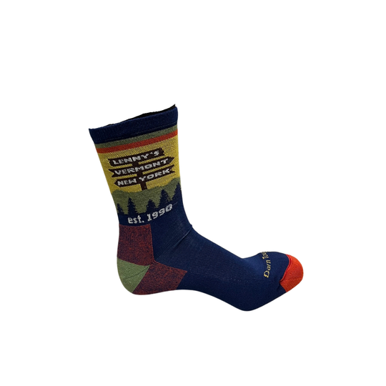 A single crew sock with a navy blue base, featuring a graphic design on the leg with the text 'LENNY'S VERMONT NEW YORK est. 1990' and a stylized forest silhouette.