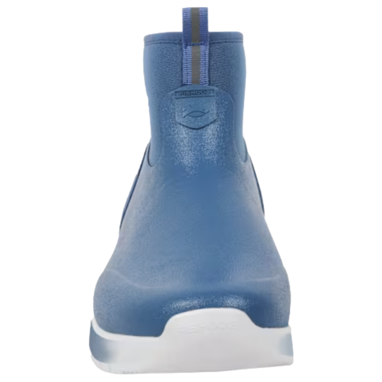 A blue ankle-high slip-on boot with a textured upper, elastic side panel, and a thick white and blue sole, shown from a front profile on a white background.
