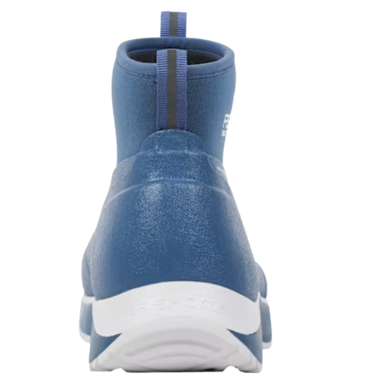 A blue ankle-high slip-on boot with a textured upper, elastic side panel, and a thick white and blue sole, shown from a back profile on a white background.