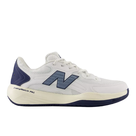 A New Balance athletic shoe in white and navy blue, shown from a side profile view against a plain white background.