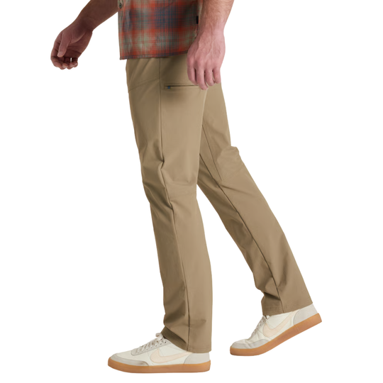Kuhl Men's Deceivr Pant - Fossil on male model side view on white background