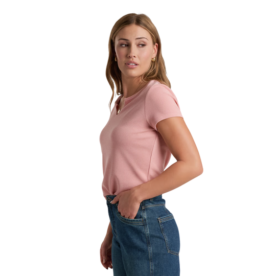 Kuhl Women's Remi Notch Tee - Coral Rose on female model on a white background