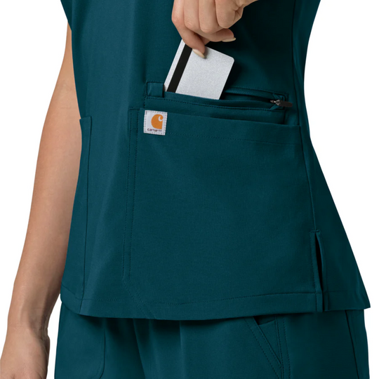 Teal V-neck scrub top with chest pocket, side slit, and a Carhartt patch.