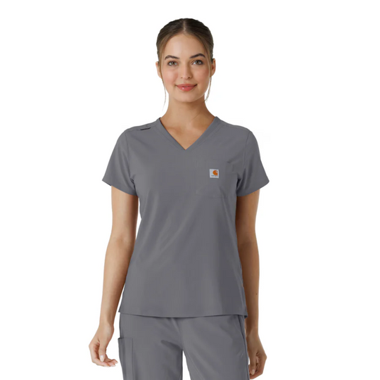 Gray V-neck scrub top with a chest pocket and Carhartt logo patch, shown on a model