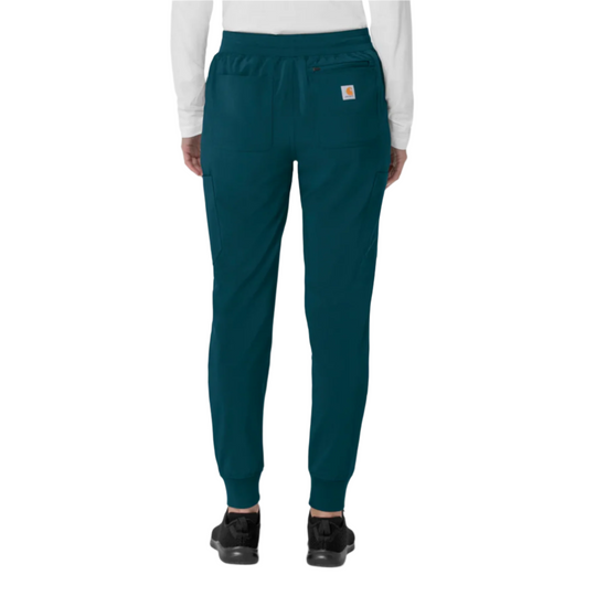 Teal scrub jogger pants with cargo pockets, ankle cuffs, and a small logo patch on the back pocket
