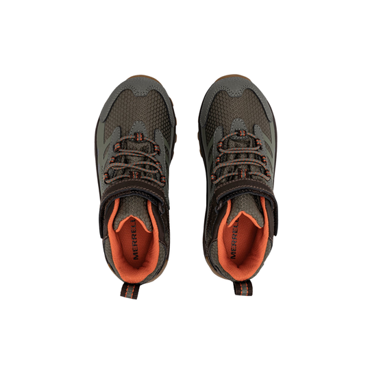 Pair of brown hiking boots with orange interior on a white background