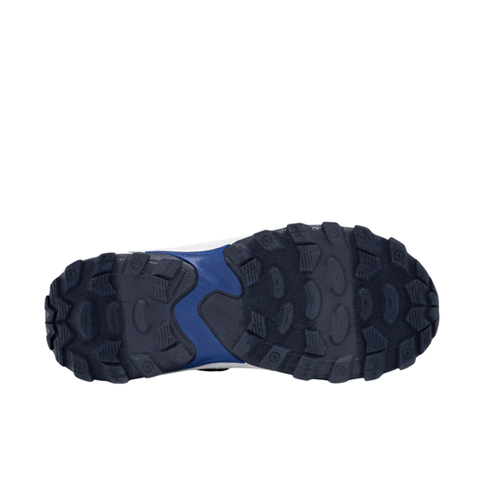 The outsole of a trail running shoe, showing a black and dark gray treaded pattern with a blue and white midsole accent visible behind it, isolated on a white background.