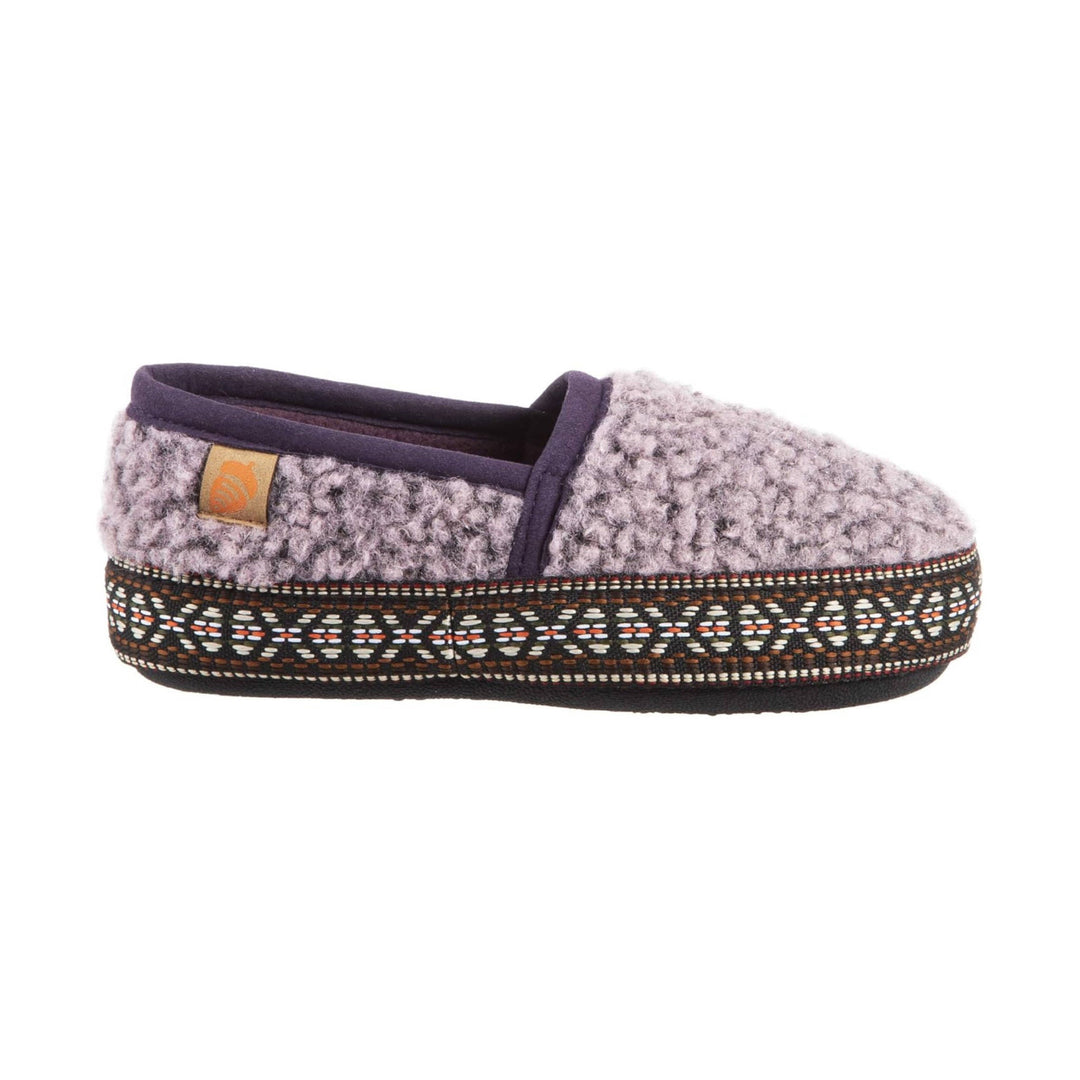 Gray fuzzy slip-on slipper with purple trim and a patterned woven sole