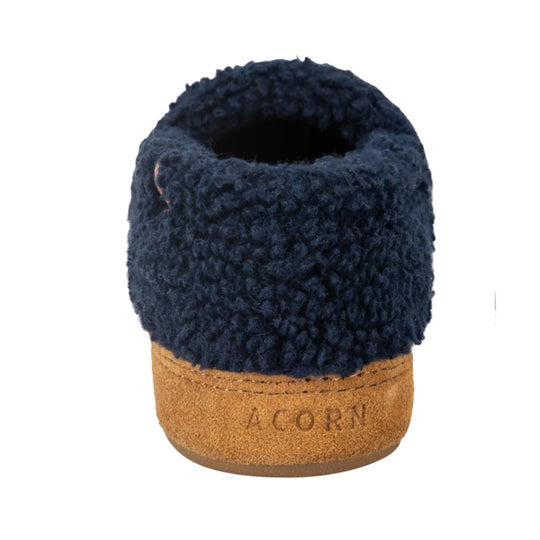 Navy fuzzy slipper with tan suede heel and ACORN branding