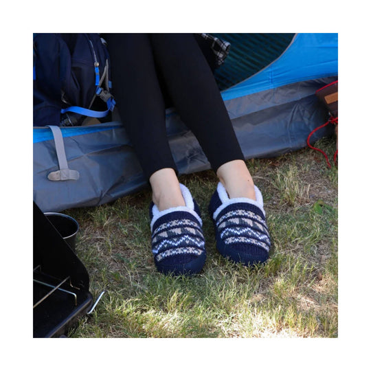 Navy knit slip-on slippers with white fleece lining and zigzag pattern