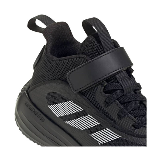 Black athletic sneaker with mesh upper, elastic laces, and heel pull tabs