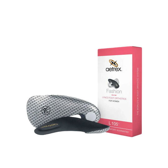 Black and gray orthotic insoles with patterned top layer beside an Aetrex Fashion L105 box