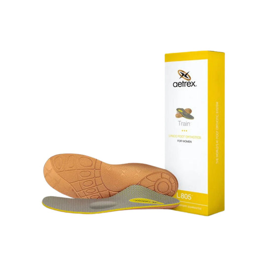 Orthotic insoles with yellow-and-gray layers, shown with a branded Aetrex box