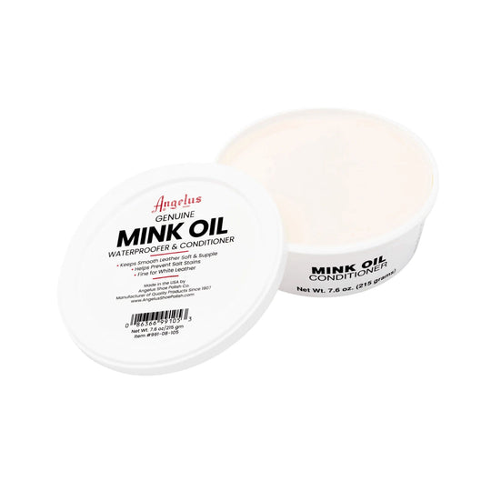 Round white tub of mink oil conditioner with a lid showing product text