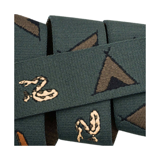 Close-up of a dark green woven belt with tan and black geometric pattern accents