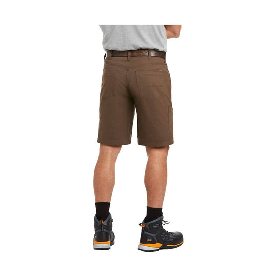 Person wearing brown shorts on a white background